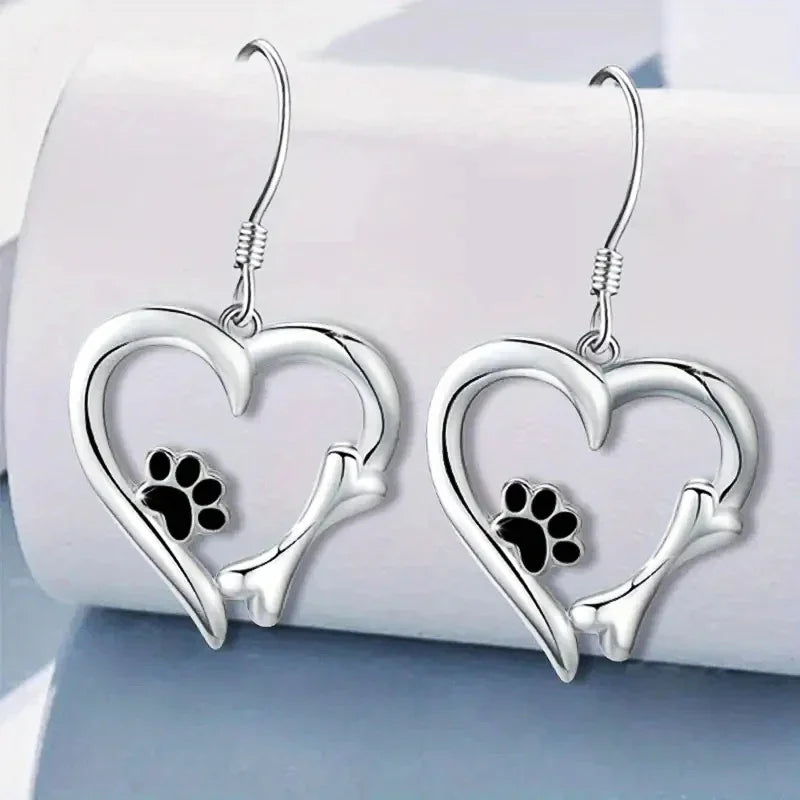 Silver drop earrings with heart and paw print motif